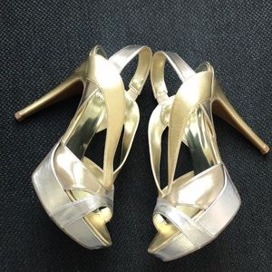 Guess platform silver gold pump. Cutout straps. Never worn.